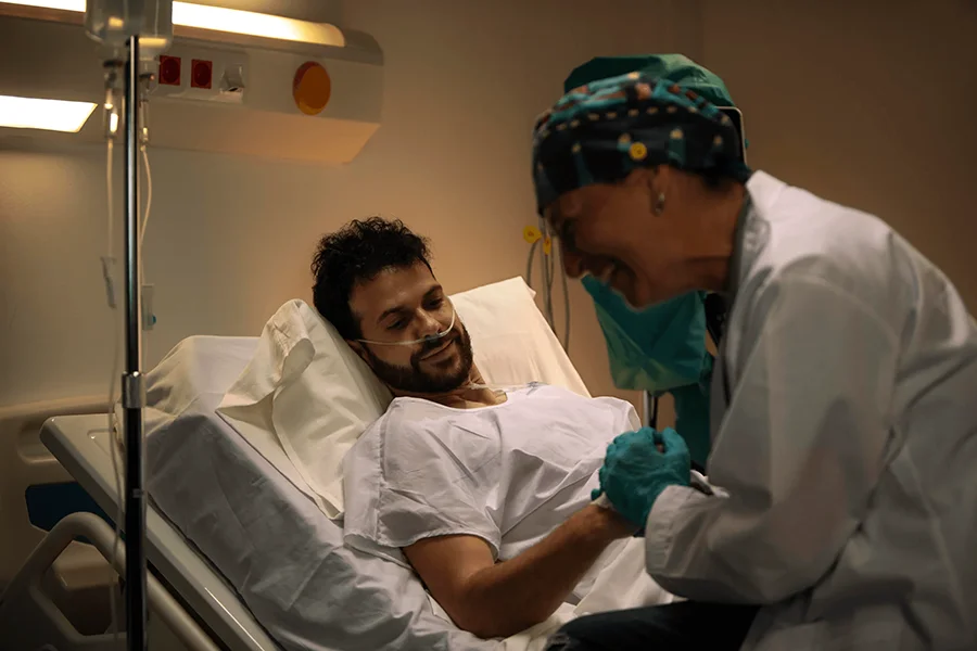 doctor-checking-one-her-patients-scaled